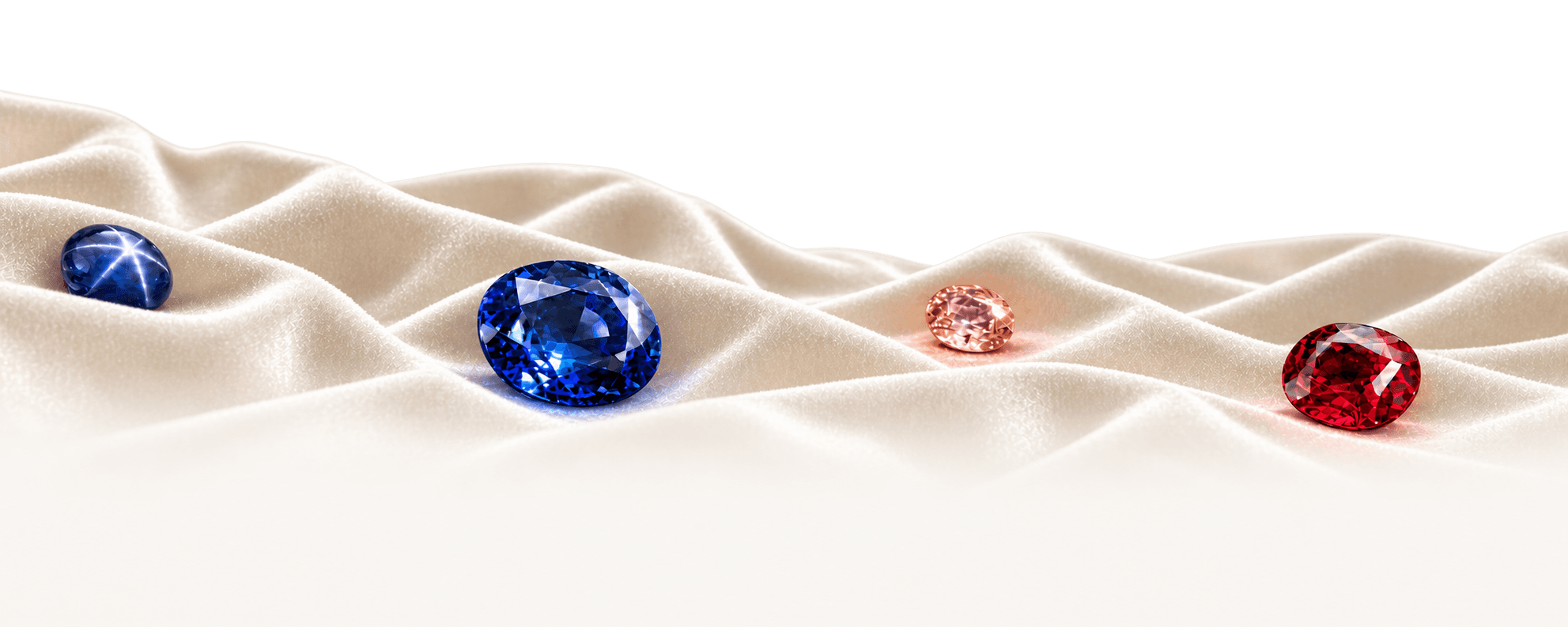 Natural sapphires and a ruby resting on ivory satin fabric