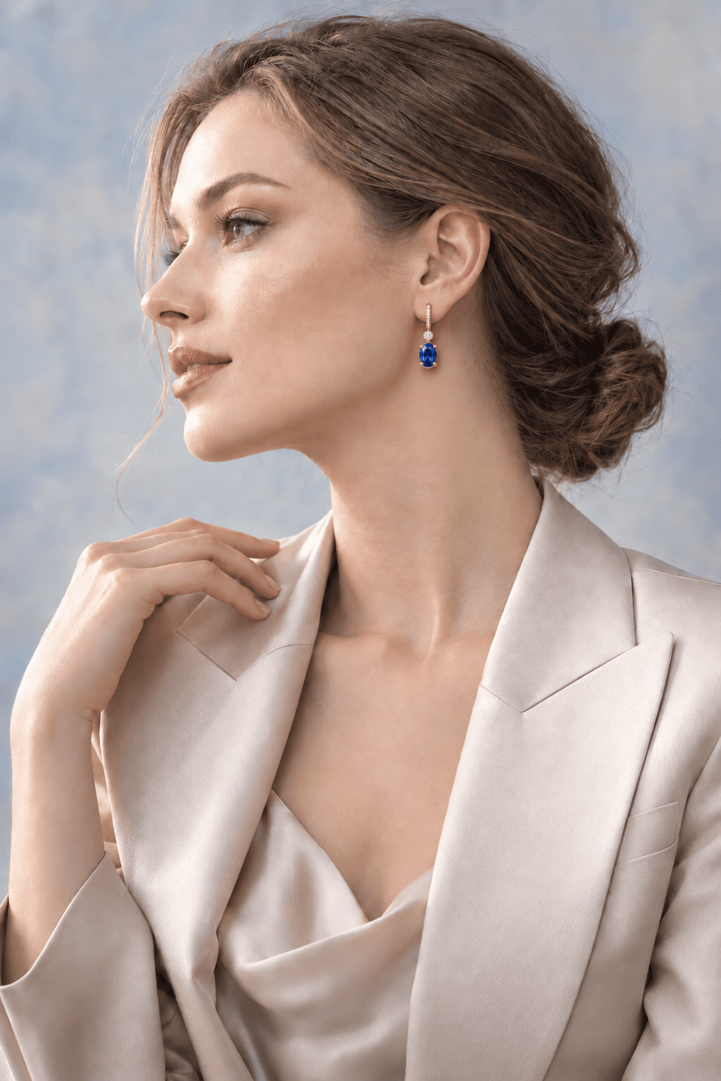 Woman wearing a Tapro Gems sapphire drop earring